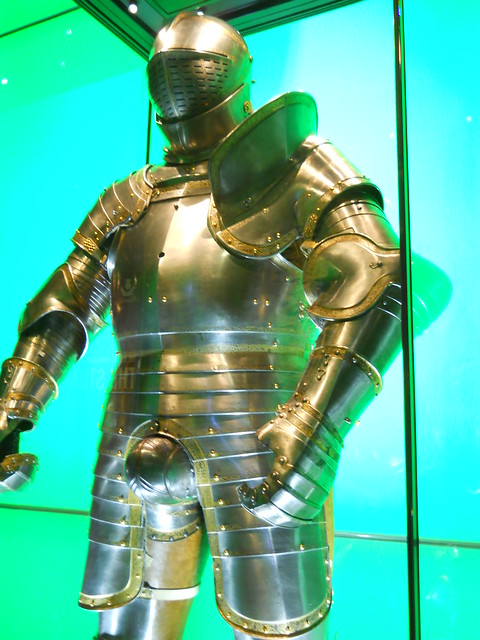 Heroic knight damaged golden plate armor rendered in