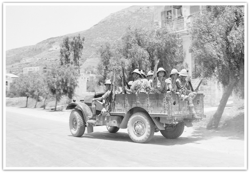 British troops from the Irish Guards Regiment ( or are they "2nd Battalion Black Watch Regiment ? ) on outskirts of Nablus, Palestine circa 1938