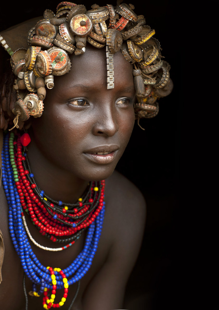Dassanech girl with caps wig - Omorate Ethiopia
