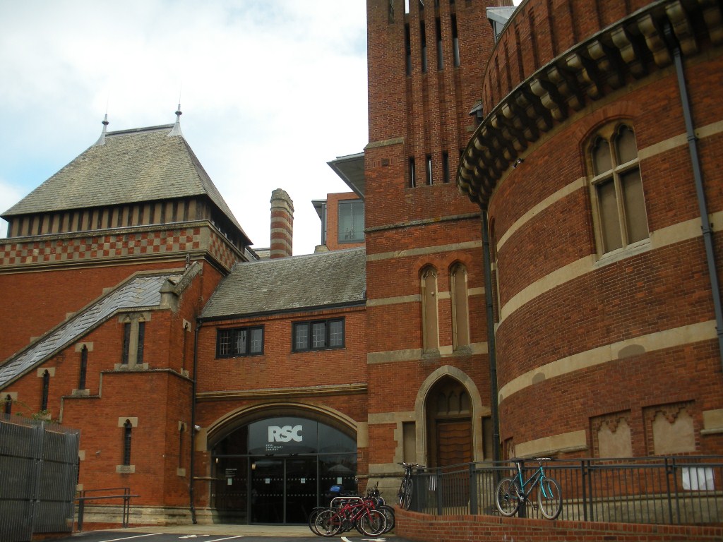 A photo of the RSC, Royal Shakespeare Company's red brick building.
