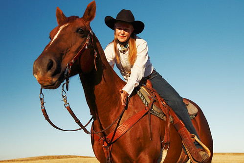 ranch travel red summer horse woman sunlight west girl beautiful smiling animal horizontal proud female rural standing fun outdoors happy countryside friend cowboy montana day mare sitting mt ride country young posing gear wideangle bluesky wear clothes clear equipment jeans riding havre american western rodeo denim recreation copyspace cowgirl petting cowboyhat pats equestrian horseback stallion saddle tack apparel patting ranching frontview quarterhorse stockphoto bridle sorrel greatplains stockphotography guestranch reigns stirrups colorimage liesure ontopof horizonoverland toddklassy