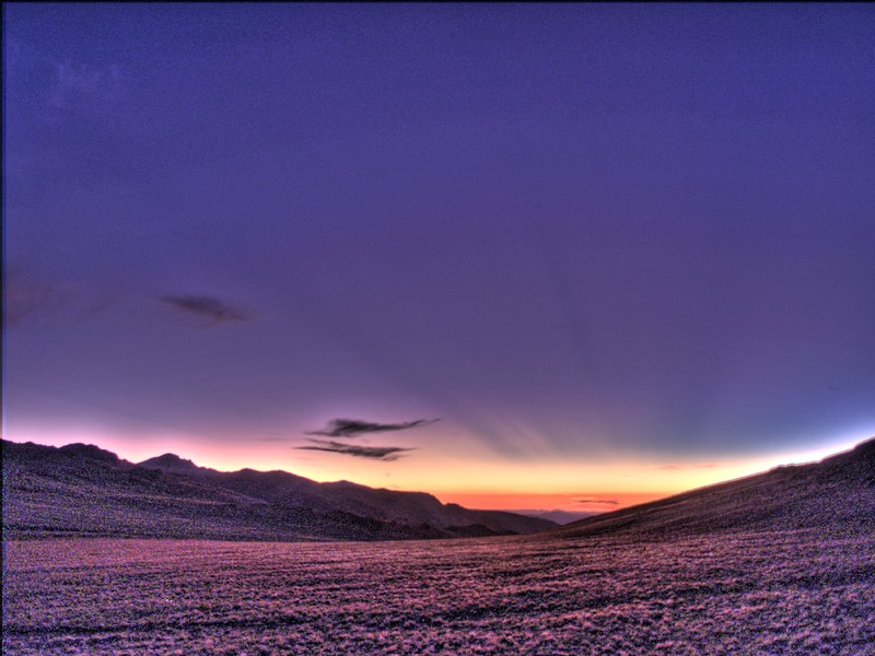 HDR shot of the sunrise with crepuscular rays at the Barcroft Gate