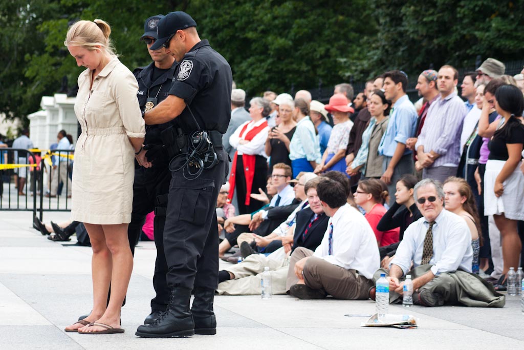 A Young Woman Arrested in front of White House - a photo 