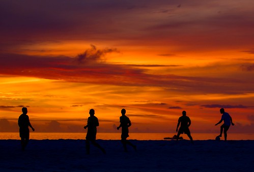 sunset sky fish male beach sports football soccer tropical maldives atoll teamsports sportsrecreation madivaru