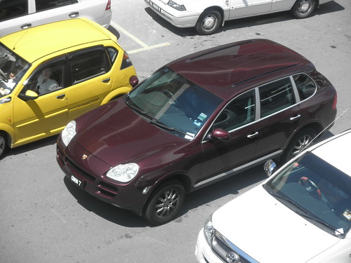 roof cars yellow logo lights nice automobile view top maroon automotive front vehicles lane malaysia kotakinabalu rides expensive porschecayenne luxury sabah tyres mpv luxurious interests thienzieyung