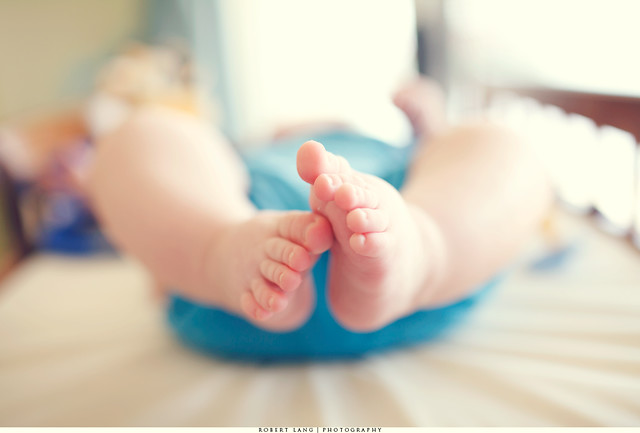 Infant feet on change table