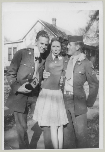 Girl and two uniforms