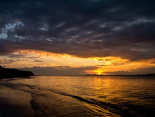 sunset beach water fiji clouds island