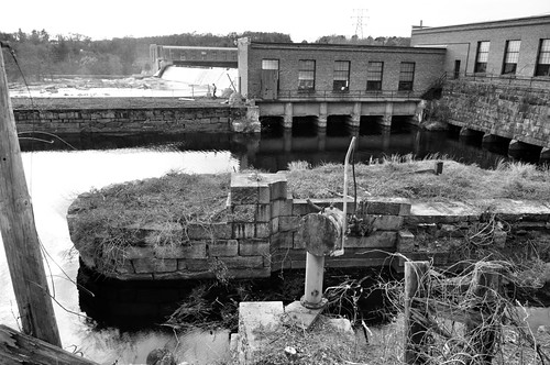 old blackandwhite bw usa building water rock stone river landscape manchester outside photo blackwhite interesting nikon energy flickr exterior power image shots outdoor dam shoreline picture newengland newhampshire engineering utility places nh hydro generator electricity historical powerplant gears scenes powerstation gundersen livefreeordie nikoncamera amoskeag psnh d5000 nikond5000 bobgundersen robertgundersen eversourceenergy eversource