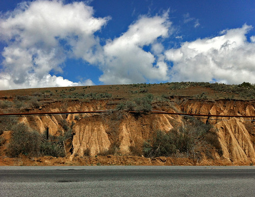 ca sky clouds landscape pipe rusty erosion ventura foothillroad lookingnorth 2216 iphone4 justsouthoftwotrees