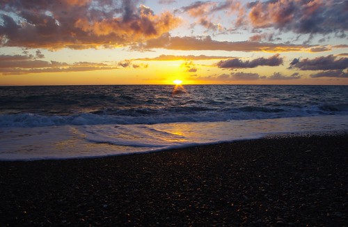 tramonto mare toscana sole spiaggia onda