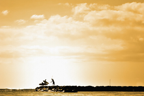 ocean sunset people beach silhouette sport canon hawaii three photo sand surf glow afternoon waikiki oahu action surfer jetty wave tint surfing photograph surfboard duotone ending afterglow colorize 50d