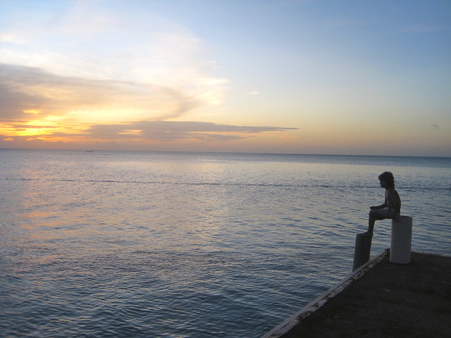 view of dock sunset luxury boutique hotel west bay, roatan honduras