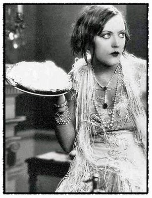 woman prepares to throw pie