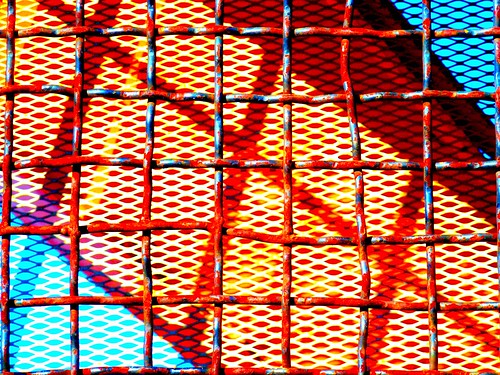 blue red orange sunlight canada black lines yellow metal rust shadows bc geometry cariboo excavator diagonals peggyhr youthinkthisisart steelrollcage p1060372p