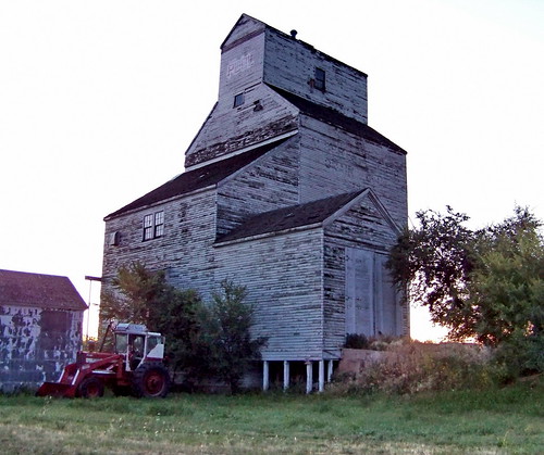 morning blue red white tractor canada color colour building tree green dawn sk prairie saskatchewan agriculture grainelevator 2011 valmarie canadagood thisdecade