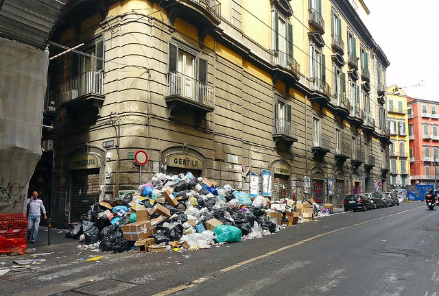 Garbage bags on a street corner