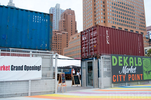 At the DeKalb Market in Brooklyn, N.Y., the farmers market is nestled among other vendors including artists, craftsmen, and chefs all housed within colorful shipping containers.  Repurposed shipping containers are housing farmers markets on undeveloped lots in, Boston and Raleigh as well. Photo courtesy of Leonel Lima Ponce