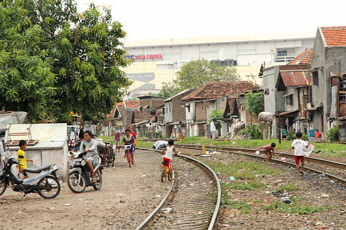 railroad people boys children indonesia march java asia crossing rails scooters railways jawa surabaya simpang 2011 eastjava meteorry jawatimur anakanak jalankapasari1 megagrosir