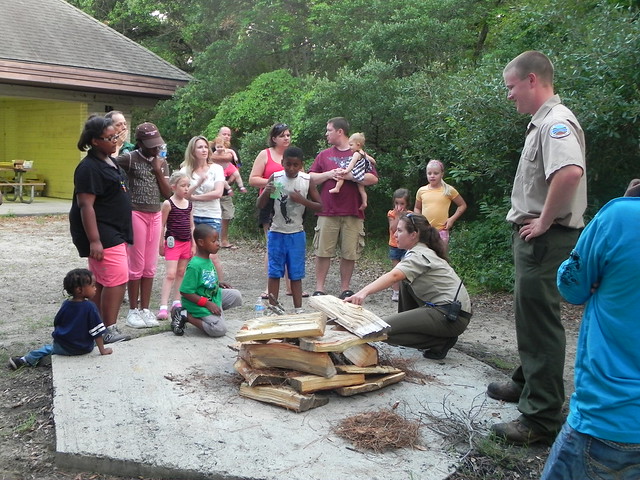 The chimney stack is a great way to build a campfire. It has good airflow and will collapse toward the center as the logs burn. Virginia State Parks