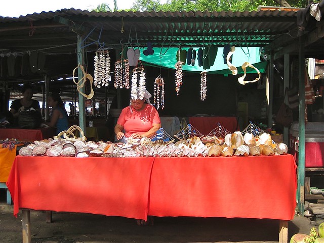 shell vendor in a seafood market in el salvador