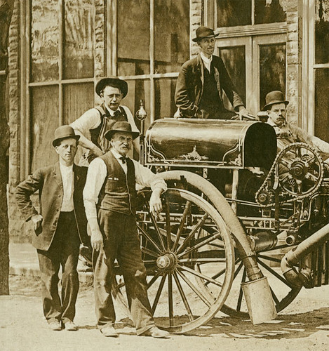 people usa man men history boys sepia kids buildings children hardware clothing andrews workmen indiana machinery firestation waterpump businesses wagons realphoto huntingtoncounty hoosierrecollections