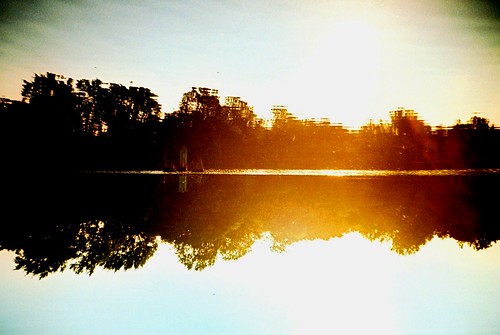 trees summer sun lake sunshine 35mm reflections evening boat lomo lca xpro lomography crossprocessed brighton glow dusk crossprocess calm 35mmfilm crossprocessing ripples analogue buoys lowdown vignette dazzle buoy lowperspective bedazzled buoyant chrome100 ripplesandreflections fotobes fishsview vignettingfromaboat