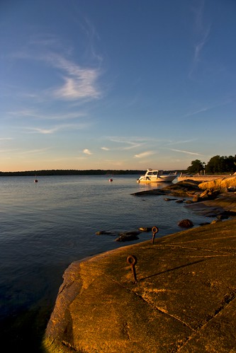 sunset sky water boat archipelago