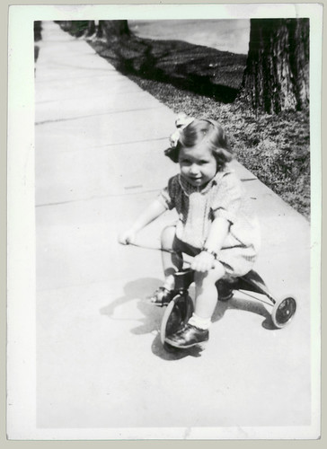Girl and tricycle