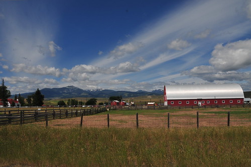 blue red sky clouds barn big montana country
