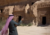 Tourist taking pictures in Madain Saleh - Saudi Arabia