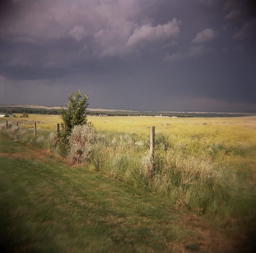 camera summer usa storm west film rain america fence toy holga post july american thunderstorm wyoming 120n glendo