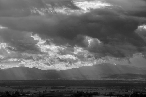 light sky bw france mountains nature rain clouds germany landscape blackwhite view alsace baden vosges sunbeams badenwuerttemberg batzenberg paffenweiler