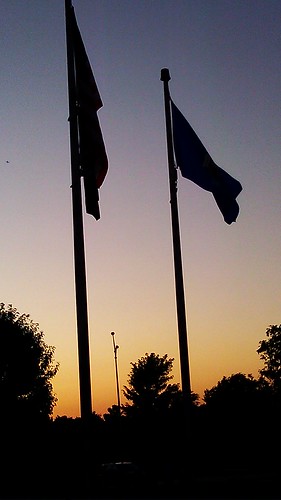 sunset silhouette flags