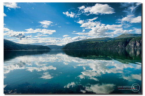 blue sky mountain reflection water clouds nikon fjord serene f28 kristiansen fjell geir 2470mm fjellet utvik d700 2470mmf28g