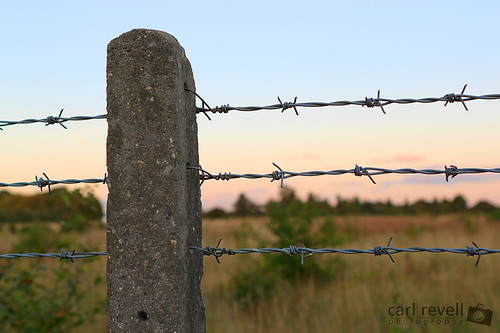 sky fence concrete barbedwire