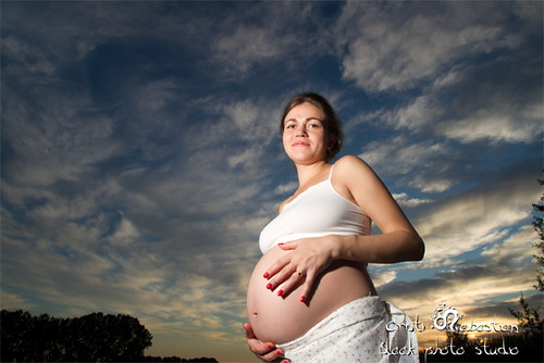 Pregnant Woman Awaiting for the Sunset