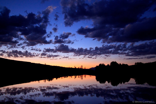 sunset lake clouds golf raven