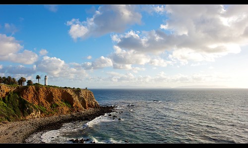 sea cliff lighthouse shore