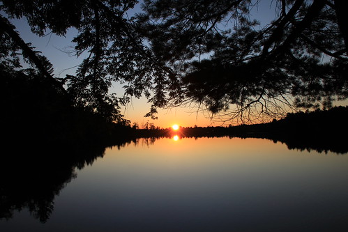 camping trees sunset summer sun lake reflection water wisconsin canoeing upnorth reflexions gordonlake