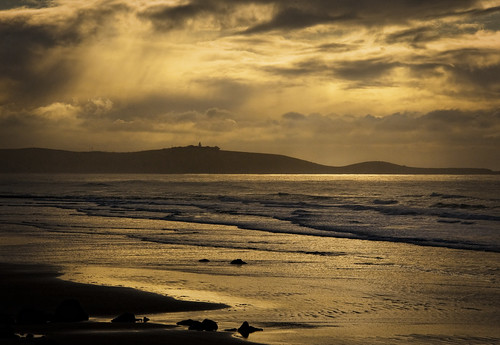 ocean sea lighthouse beach clouds sunrise waves pacific nz otago aotearoa moeraki katiki