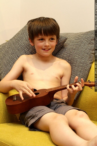 nick plays ukulele