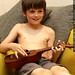 nick plays ukulele