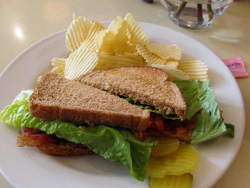 food tomato lunch restaurant bacon kentucky toast bank tasty plate sandwich lettuce dillpickle vault potatochips slices blt whitesburg satisfying letchercounty courthousecafe luncheonware