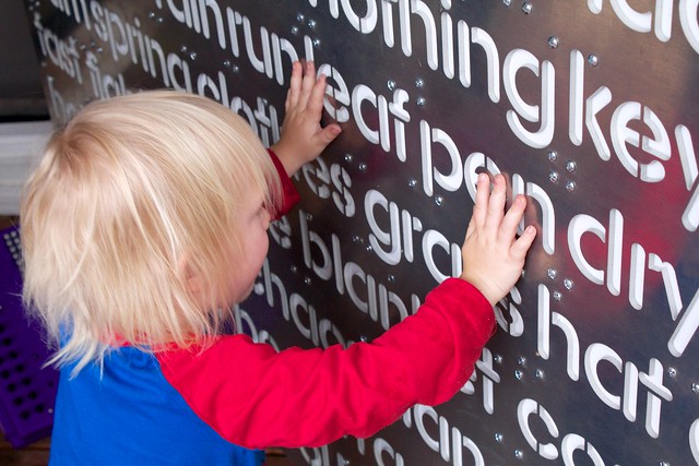 Auggie Playing With The Word Wall