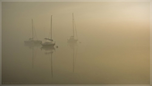 fog sunrise river boats