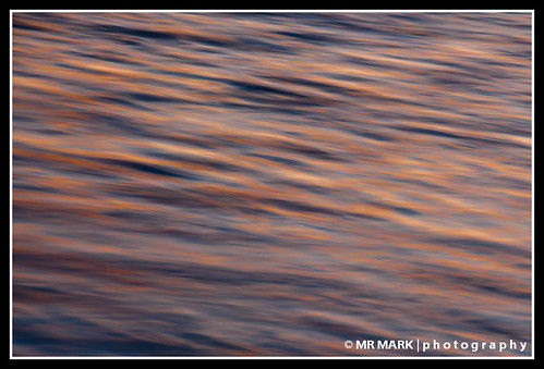 blue orange abstract blur reflection water colors sunrise waves florida reflected fl ripples destin
