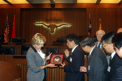 Mayor Betsy Price and Mayor Li Zaiyong exchange gifts after signing Sister Cities agreement