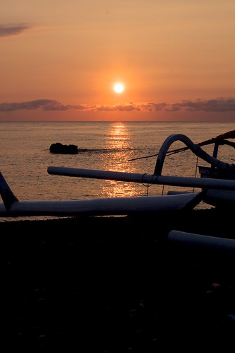 sea bali panorama water stone clouds sunrise indonesia boat waves fisherboat alambatu