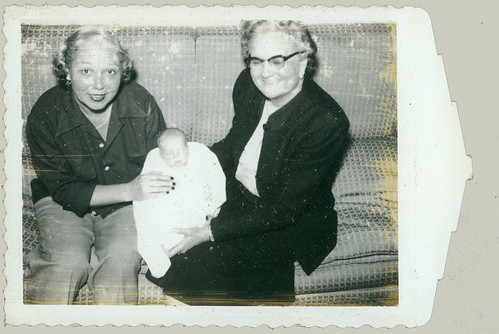 Polaroid baby with two women